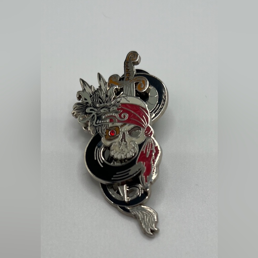 Disney Pirates of Caribbean Skull Pin with Sliding Sword